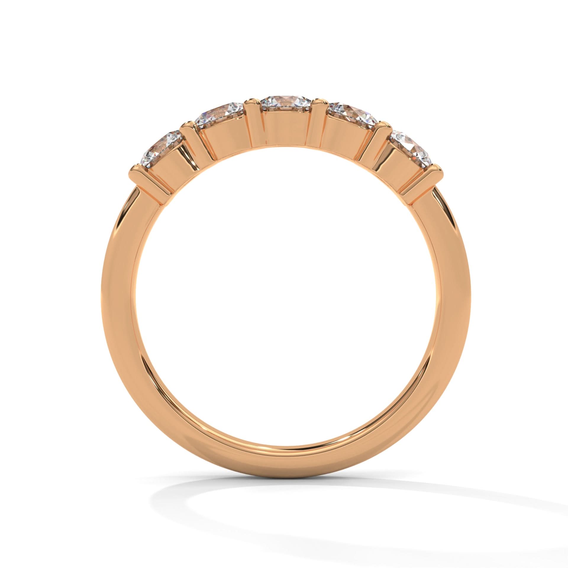 Rose gold ring with diamonds on a white background