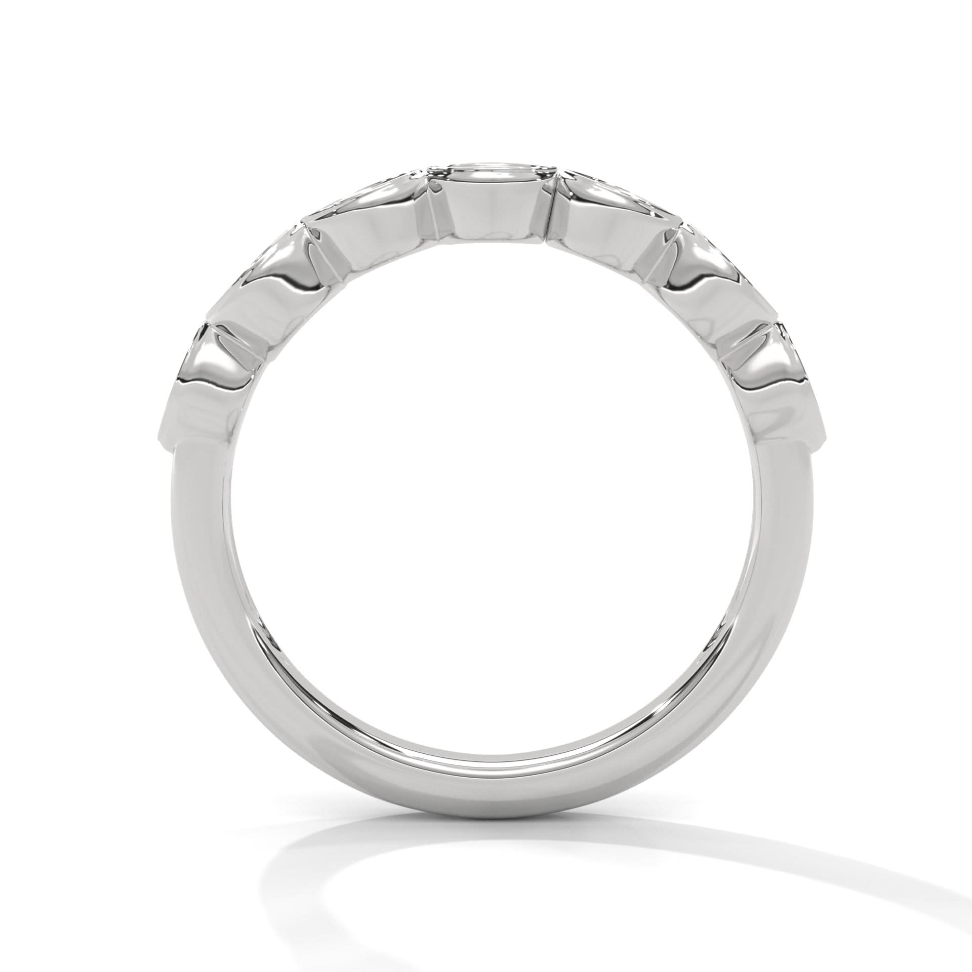 Silver ring with a textured band on a white background
