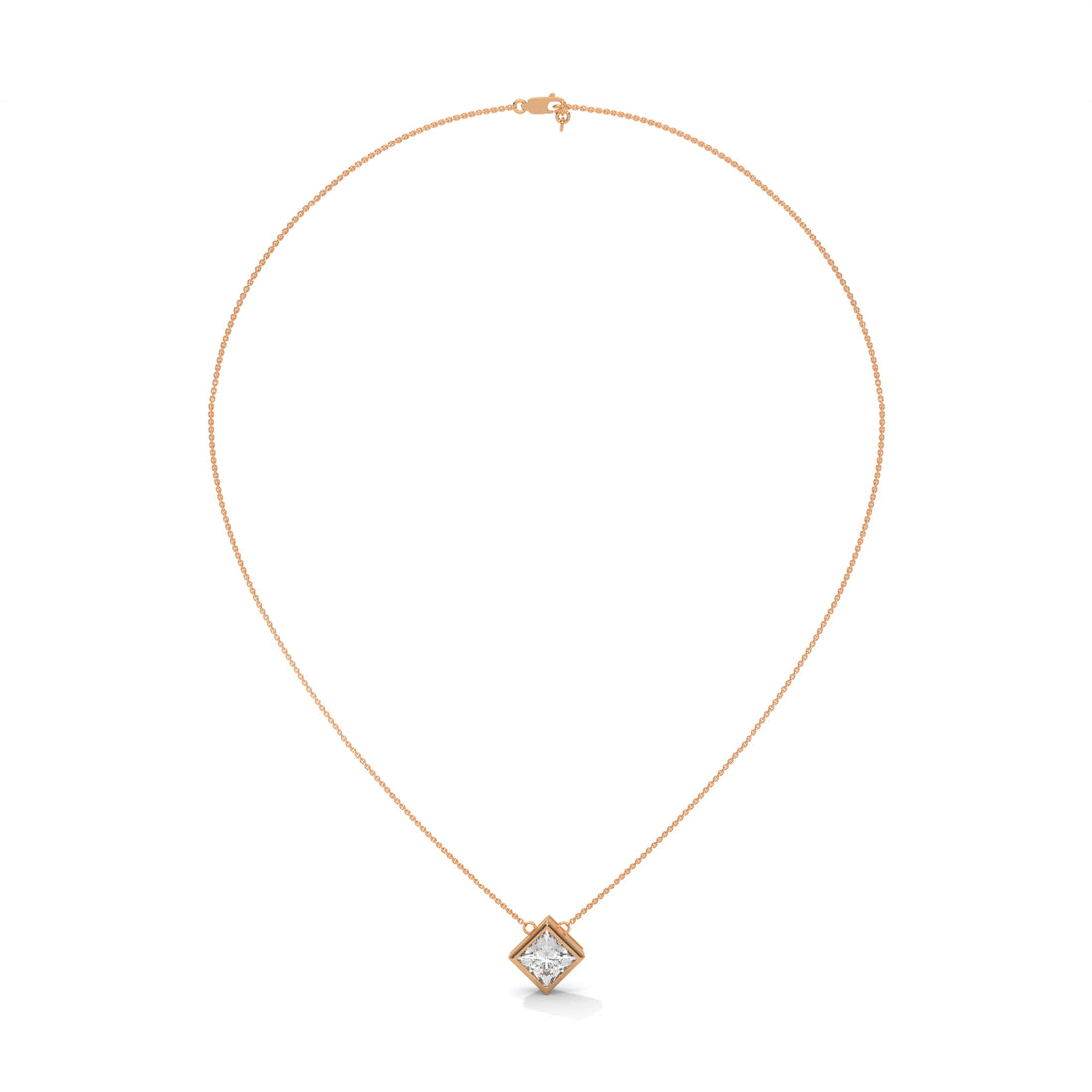 Gold necklace with a diamond pendant on a white background