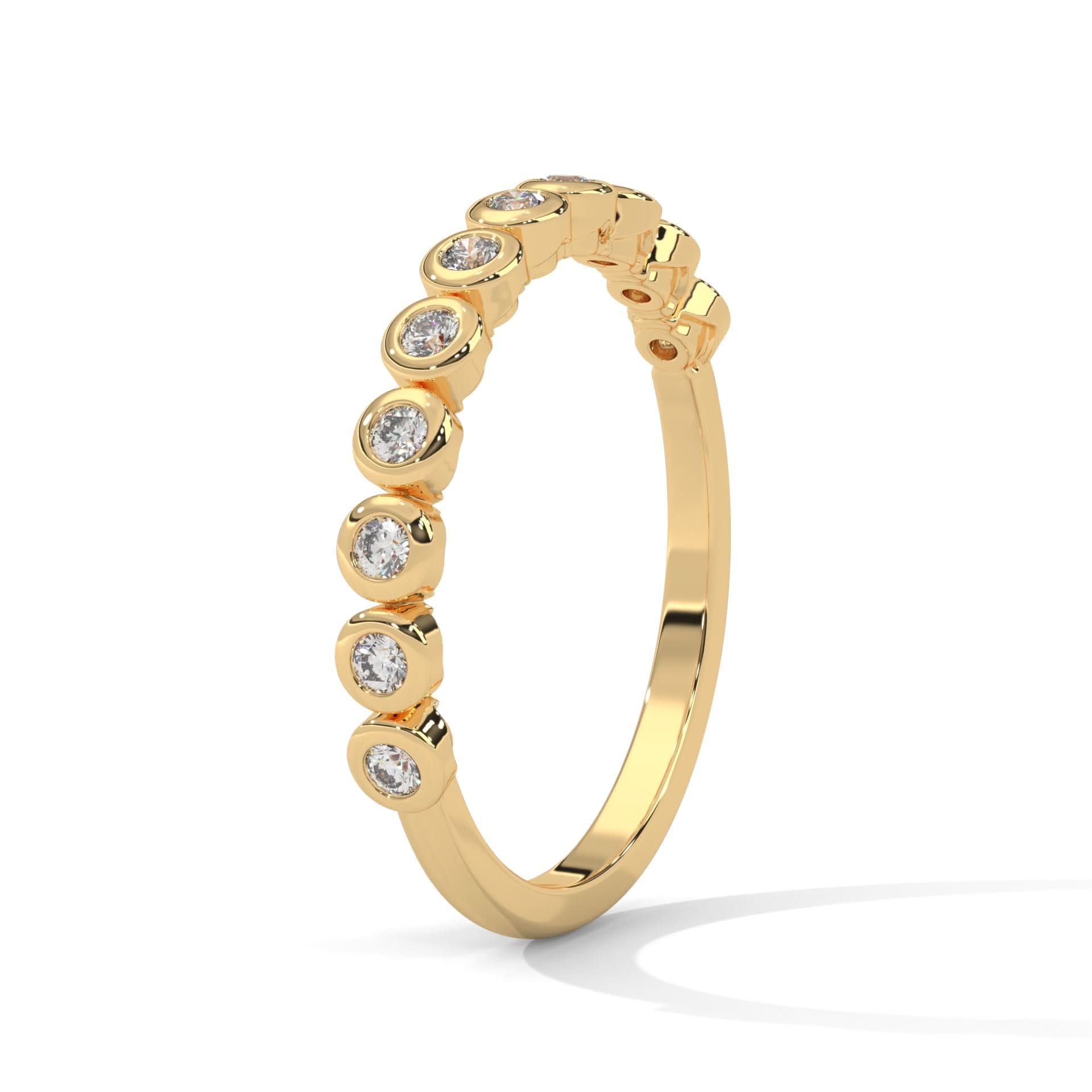 Gold ring with embedded diamonds on a white background