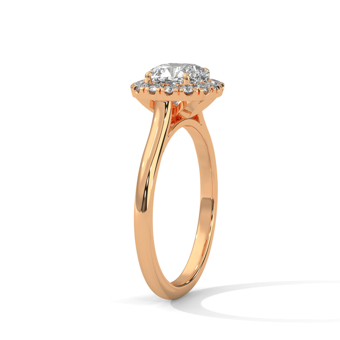 Rose gold ring with a diamond on a white background