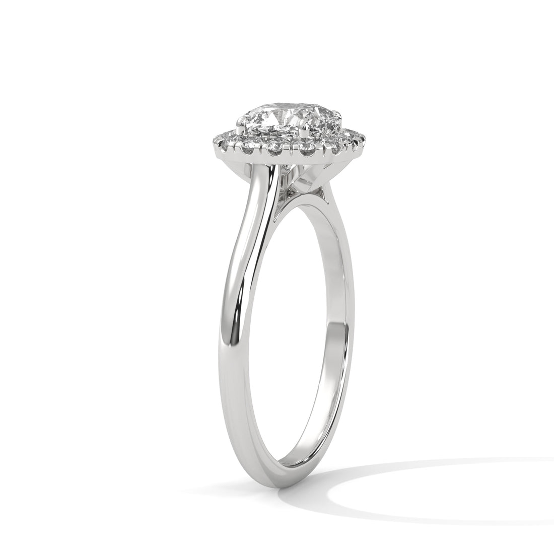 Silver ring with a diamond on a white background