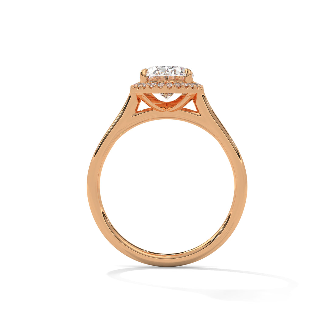 Rose gold ring with a diamond on a white background