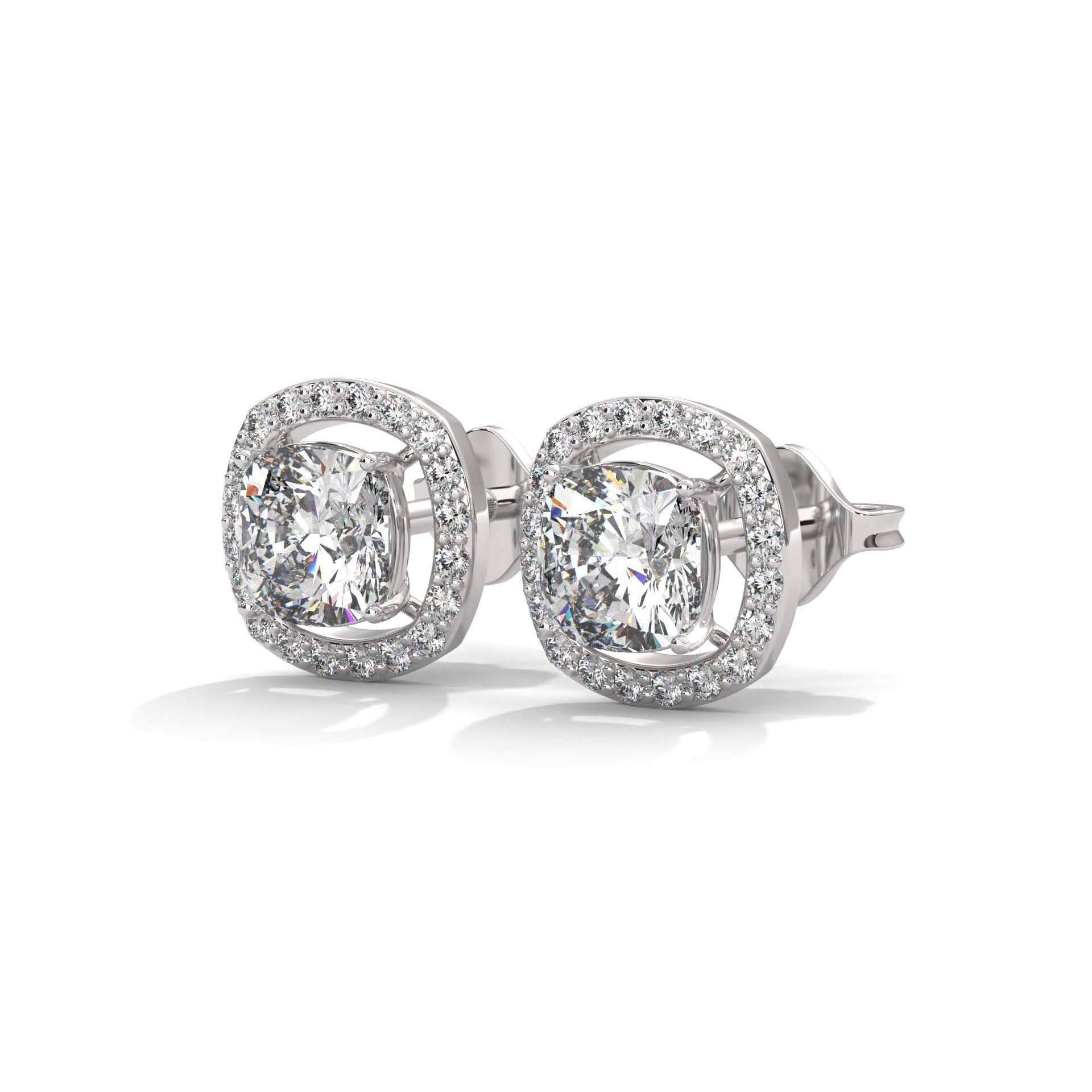 Pair of diamond stud earrings on a white background