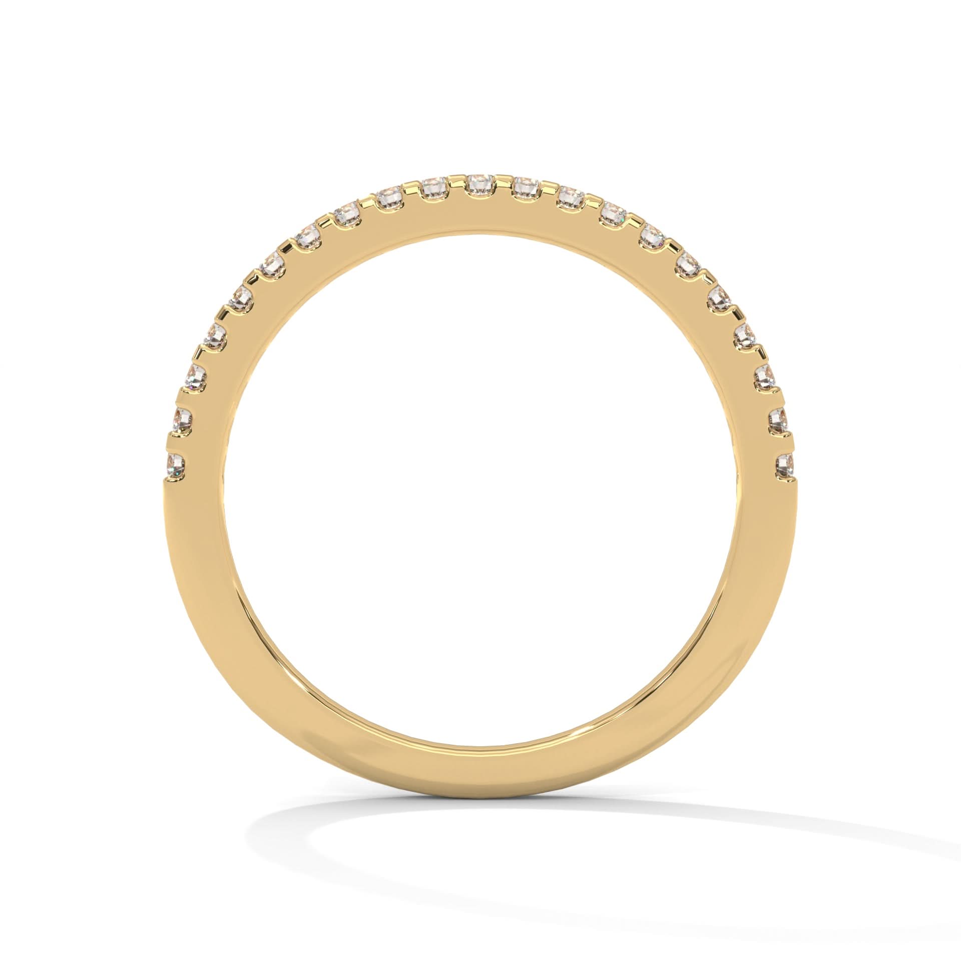 Gold ring with small diamonds on a white background