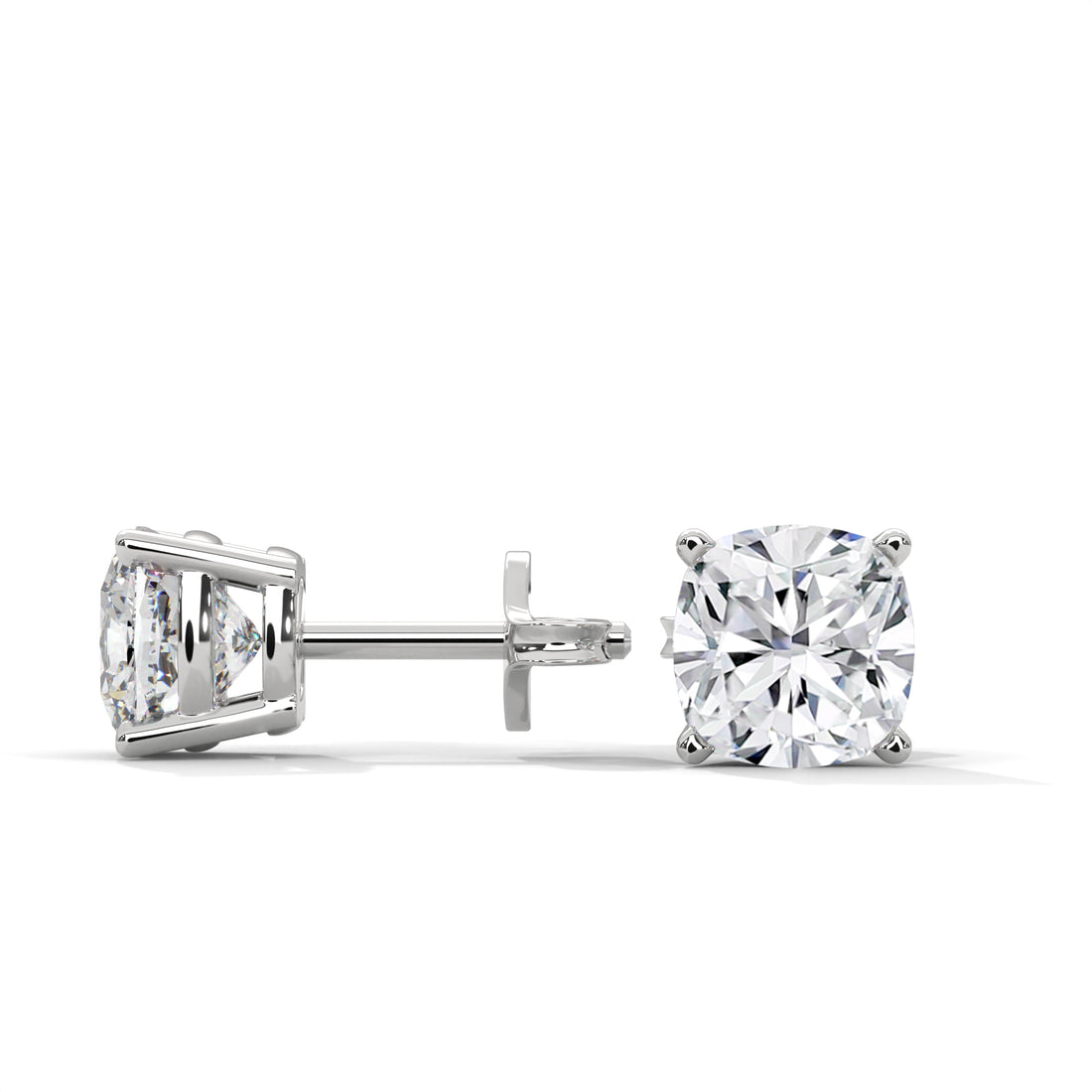 Diamond stud earrings on a white background
