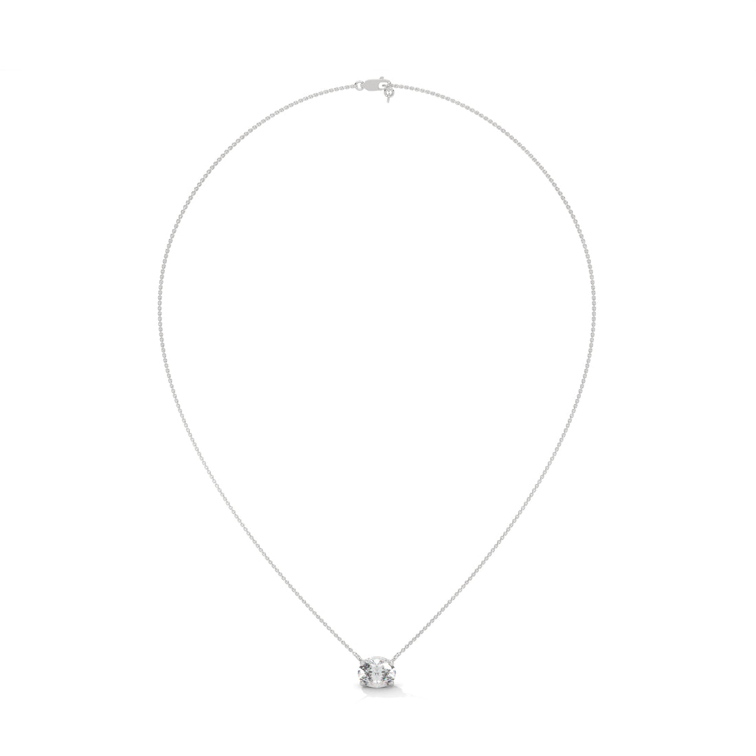 Silver necklace with a small round pendant on a white background
