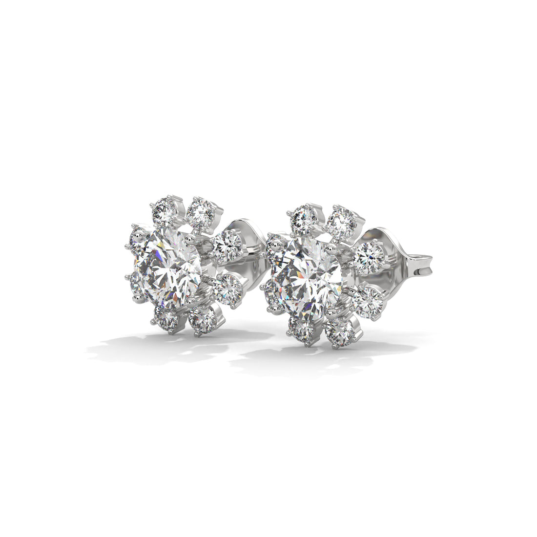 Pair of diamond stud earrings on a white background