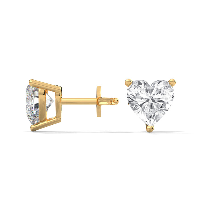 Heart-shaped diamond stud earrings on a white background