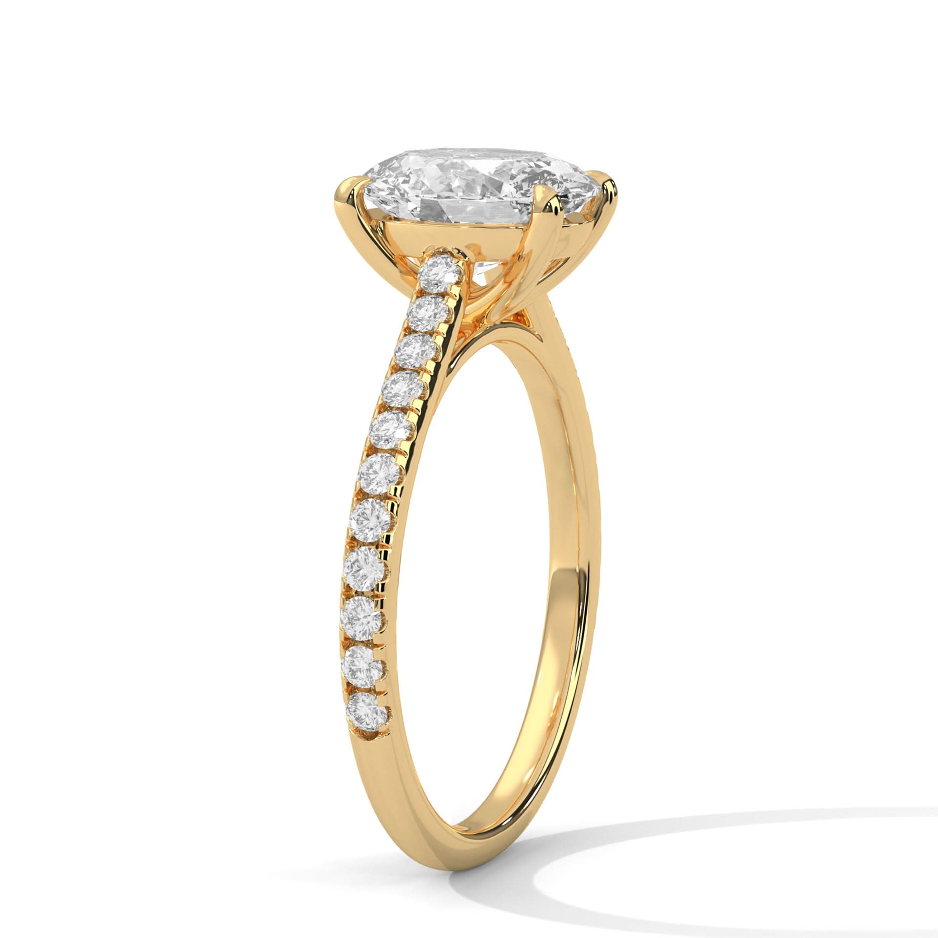 Gold ring with a large diamond and smaller diamonds on the band against a white background