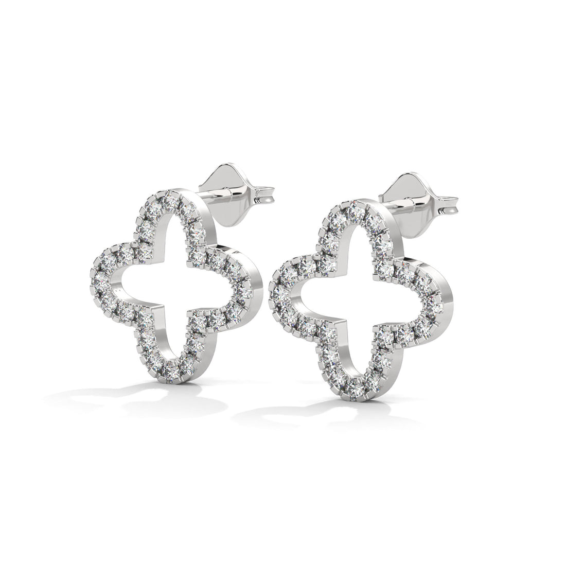 Silver butterfly-shaped earrings with clear stones on a white background
