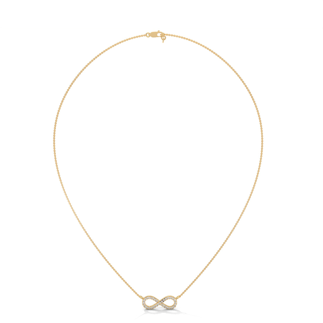Gold infinity necklace on a white background