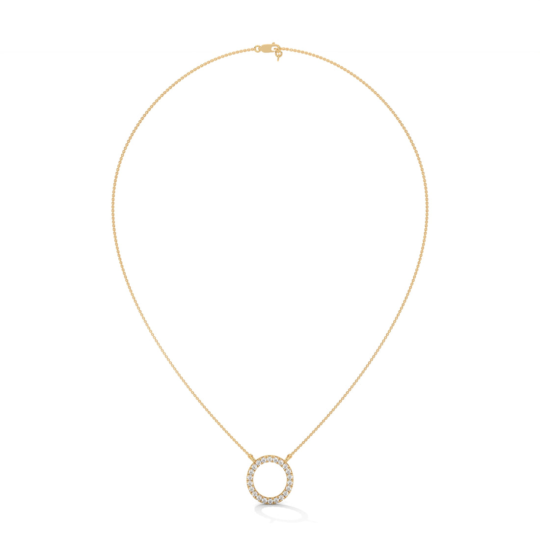 Gold necklace with a round pendant on a white background