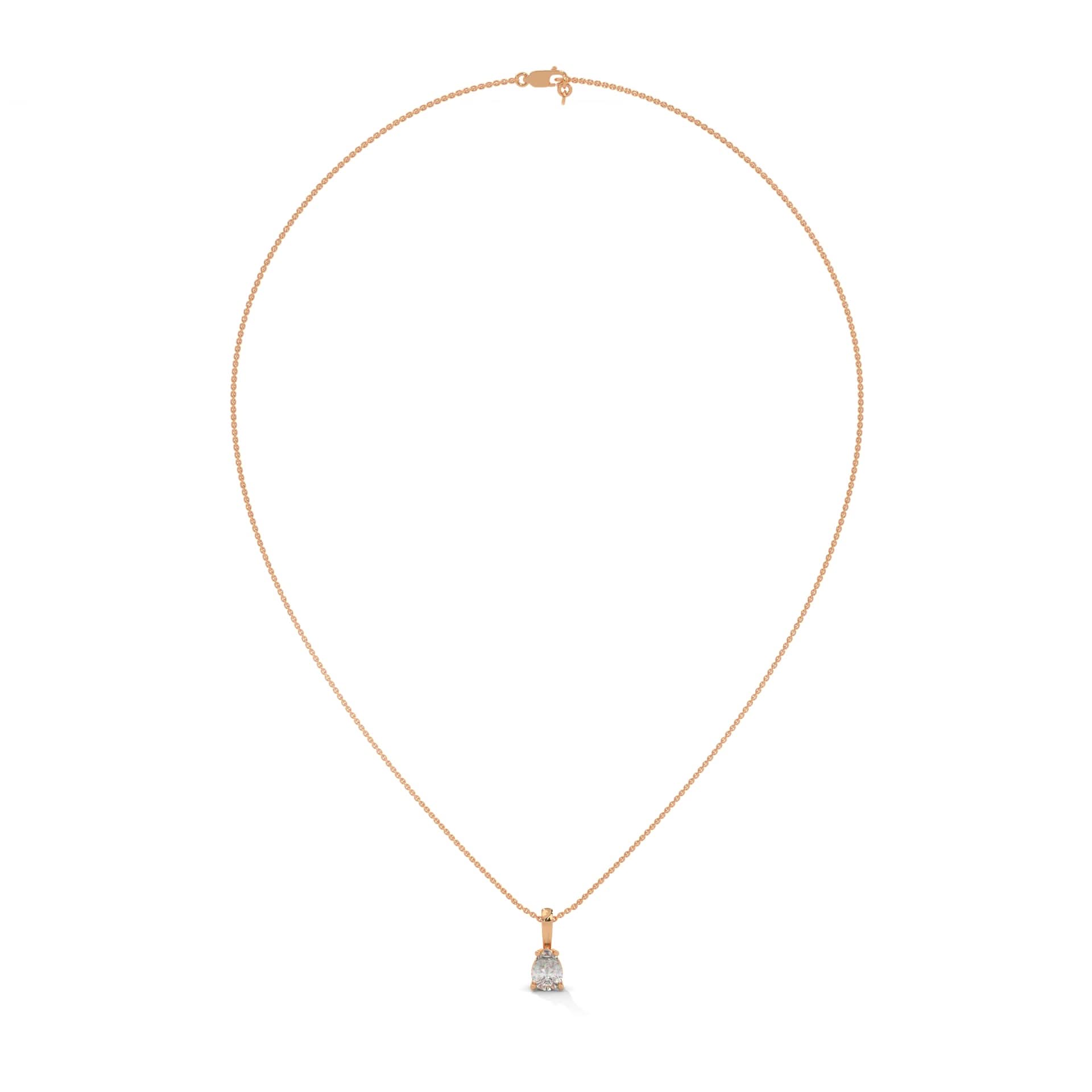 Gold necklace with a small pendant on a white background