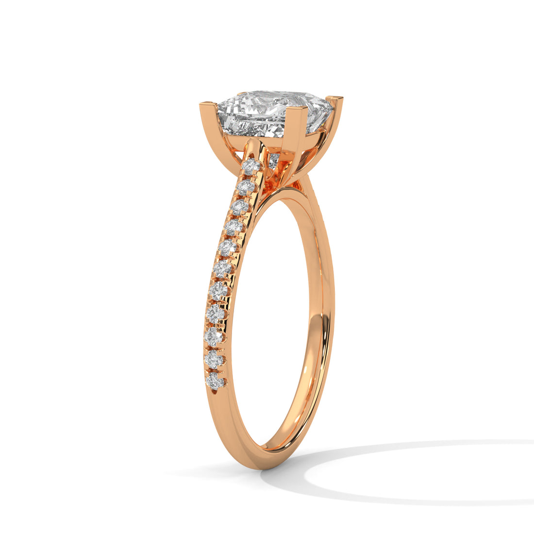 Rose gold ring with a diamond on a white background