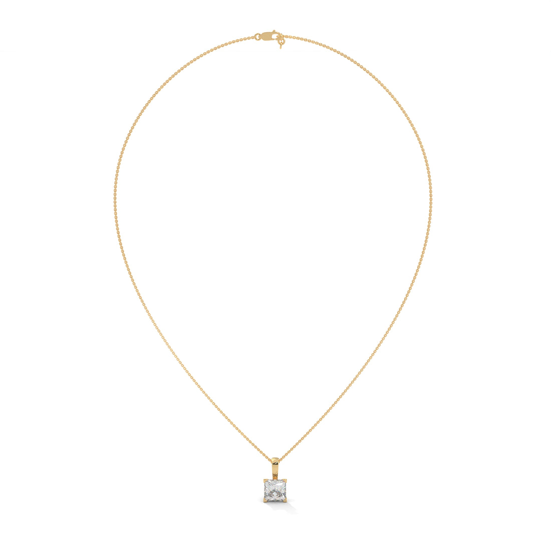 Gold necklace with a square diamond pendant on a white background