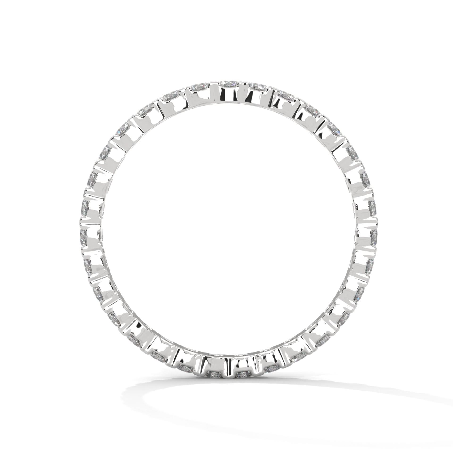 Silver ring with baguette-cut diamonds on a white background