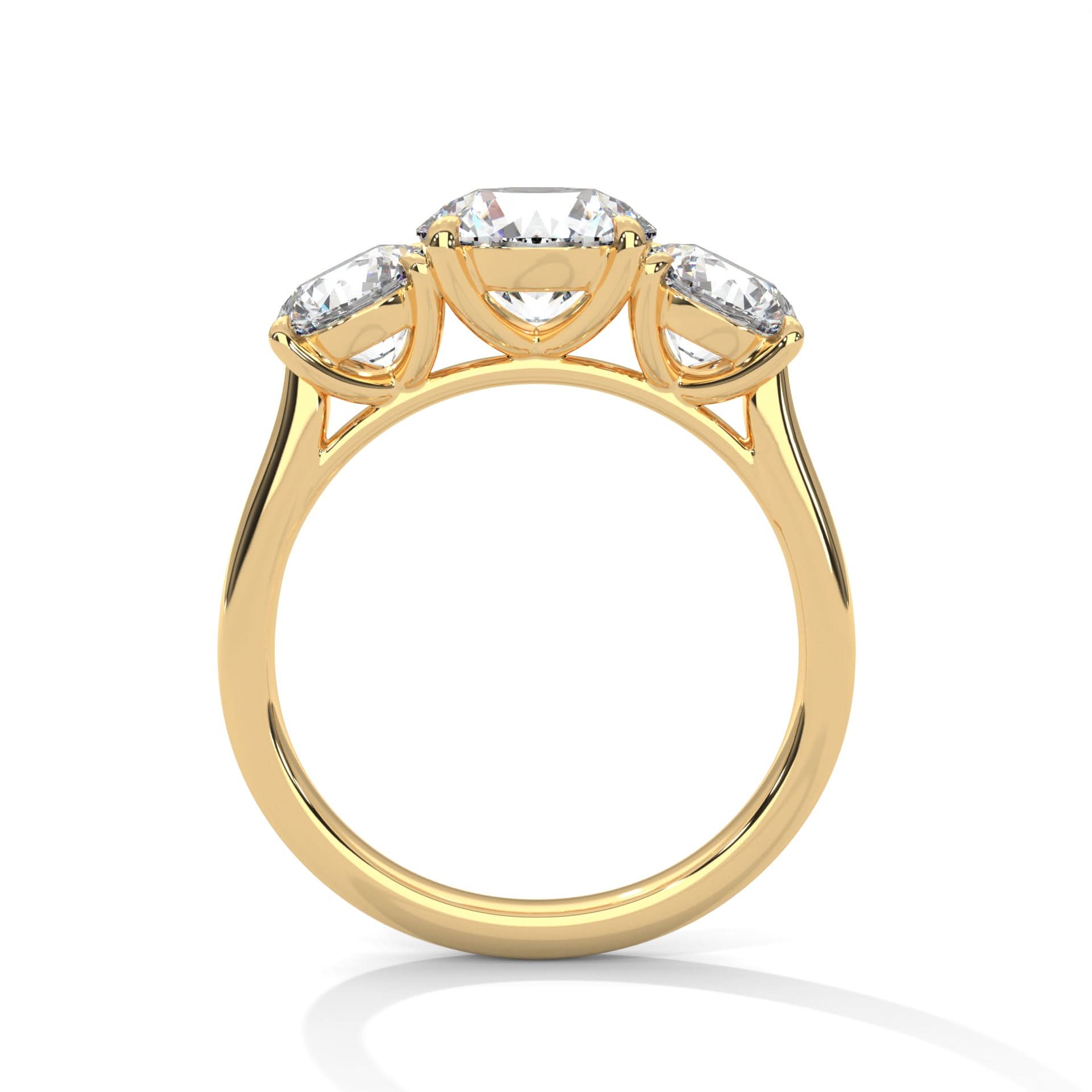 Gold ring with three diamonds on a white background