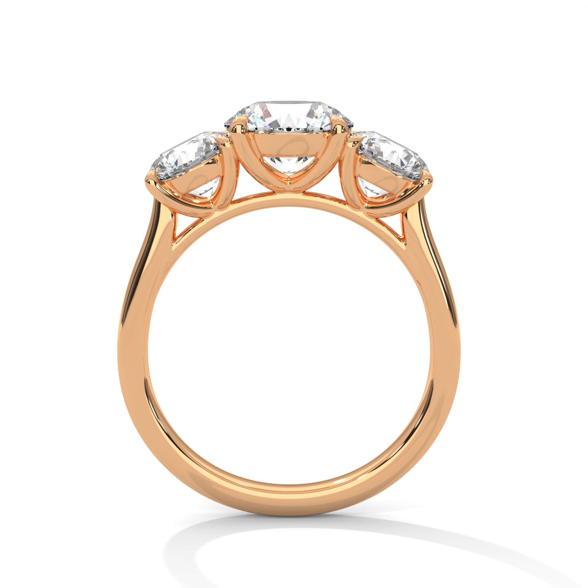 Rose gold ring with three diamonds on a white background