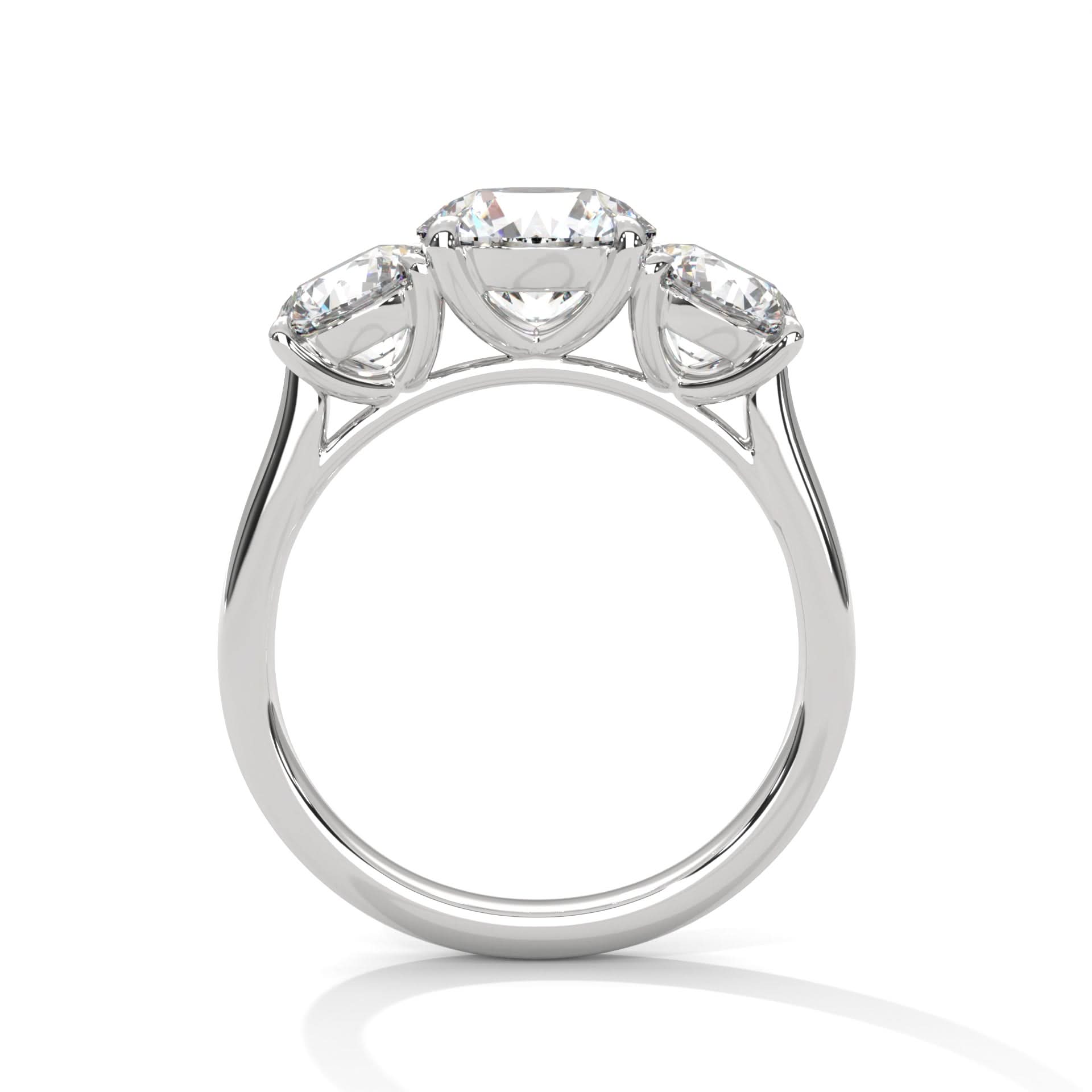 Diamond ring with three Round-shaped diamonds on a white background