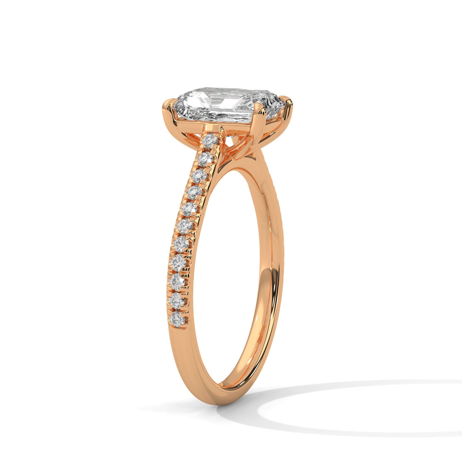 Rose gold ring with a diamond on a white background