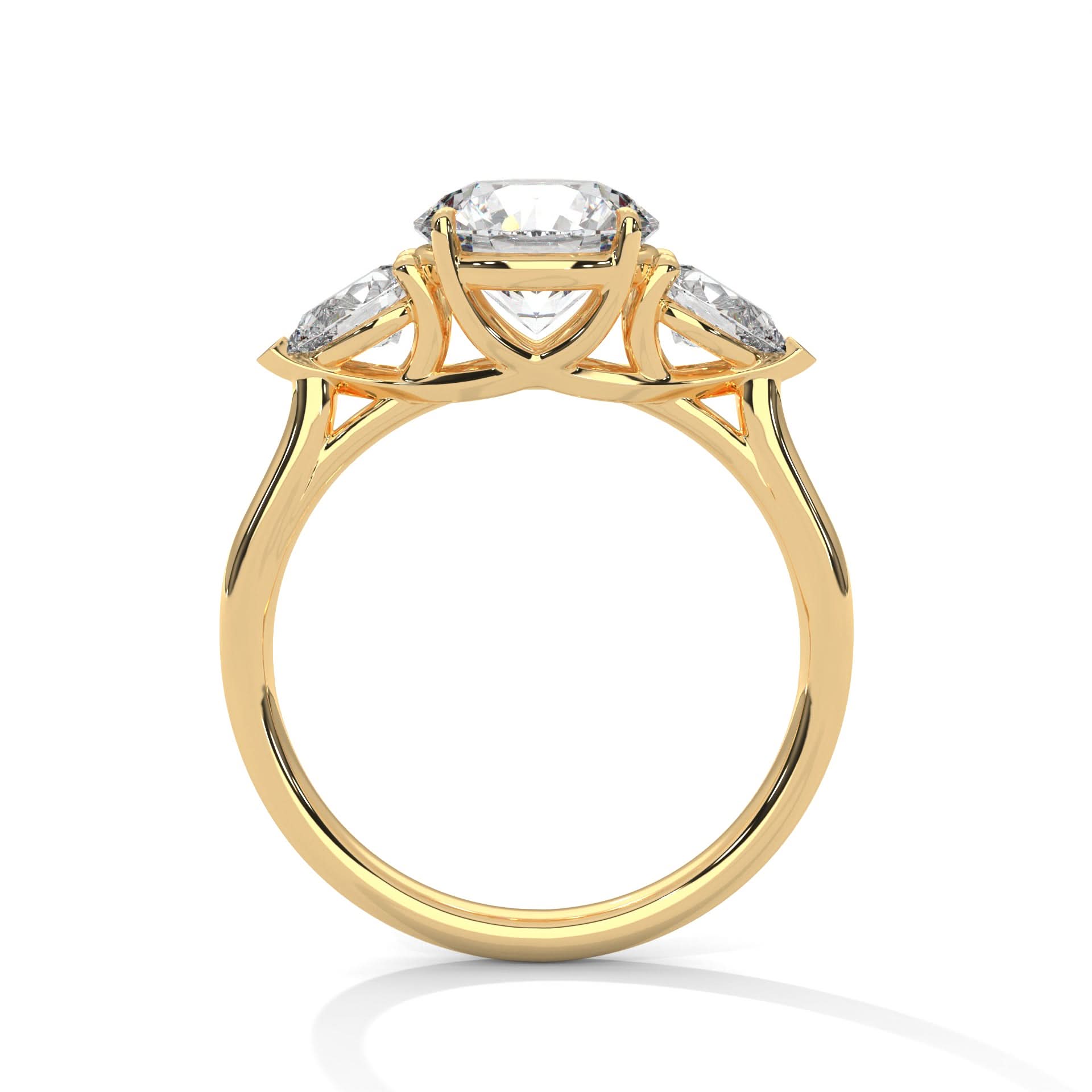 Gold ring with a central Round diamond and Pear diamonds on the sides against a white background