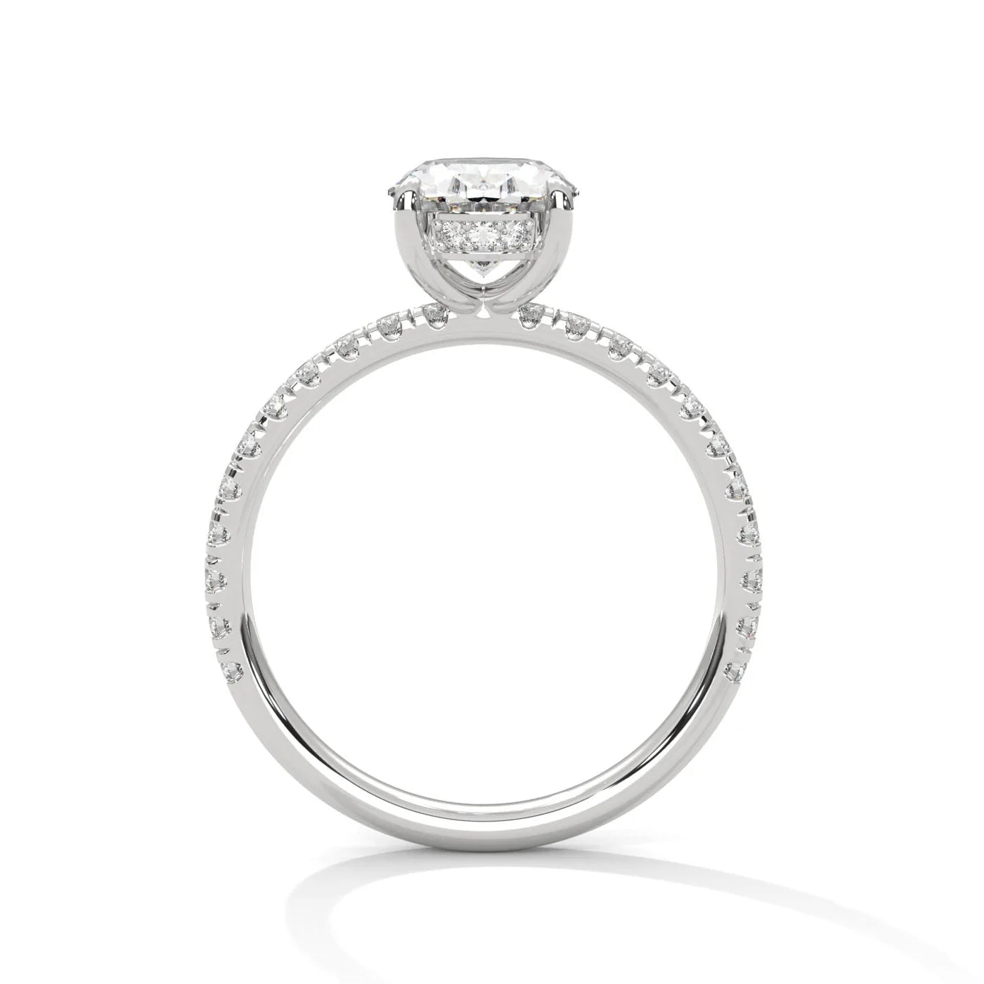 Oval Hidden Halo Diamond ring with a white background