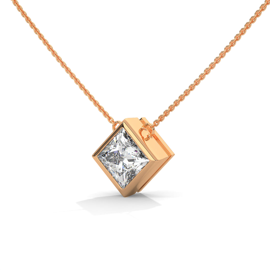 Rose gold necklace with a princess cut  diamond pendant on a white background