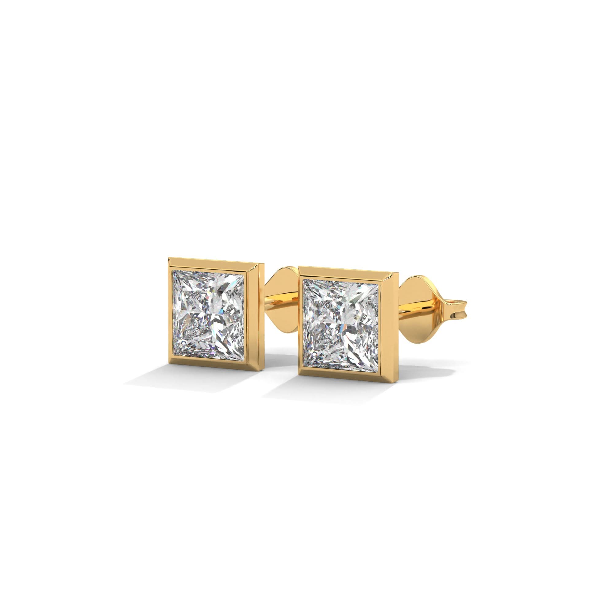 Gold earrings with clear diamond on a white background