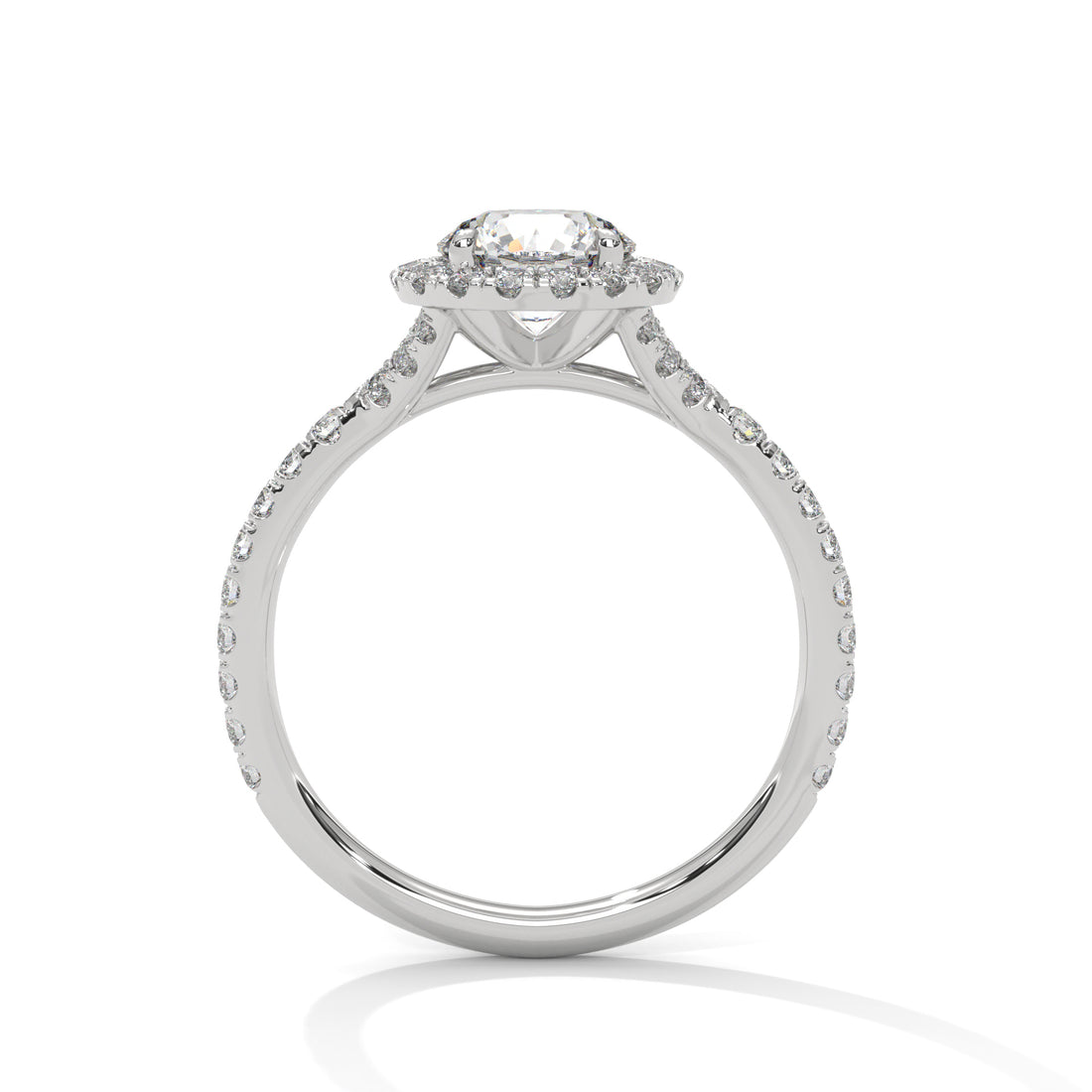 Diamond ring with a halo setting on a white background