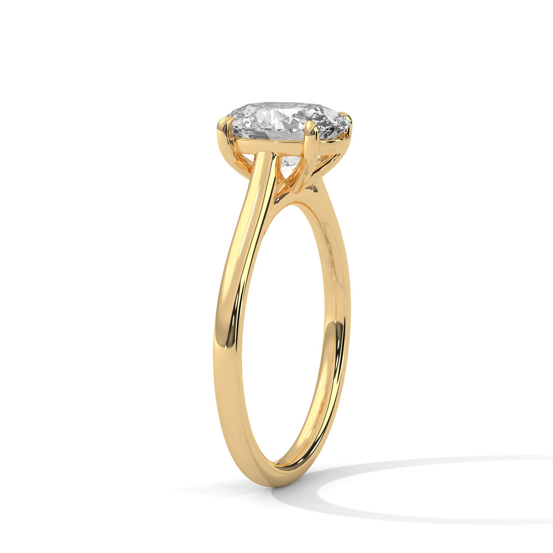 Gold ring with a diamond on a white background