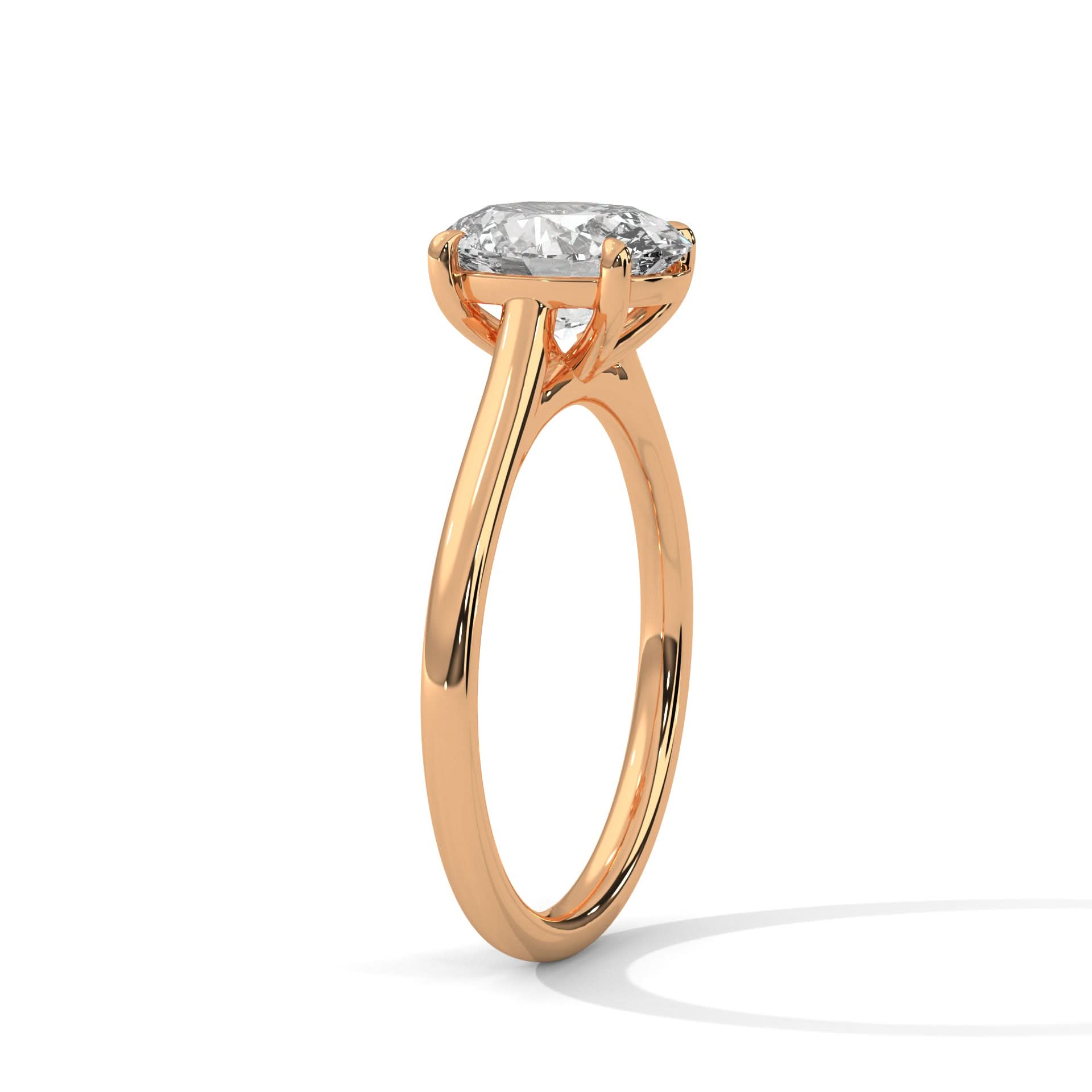 Rose gold ring with a diamond on a white background