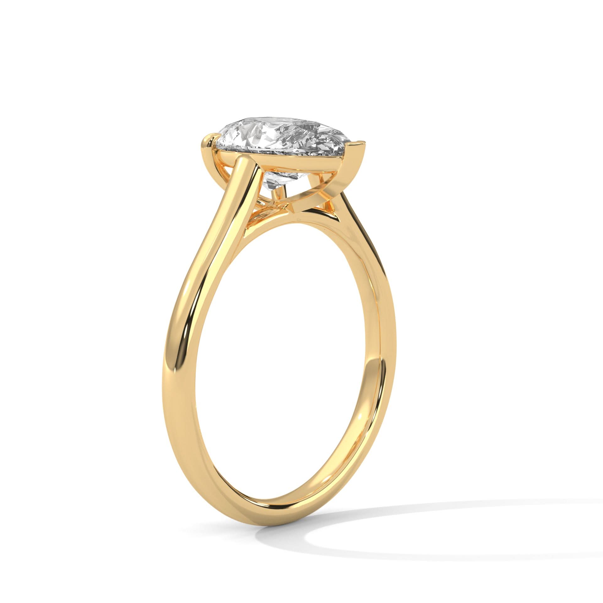 Gold ring with a diamond on a white background
