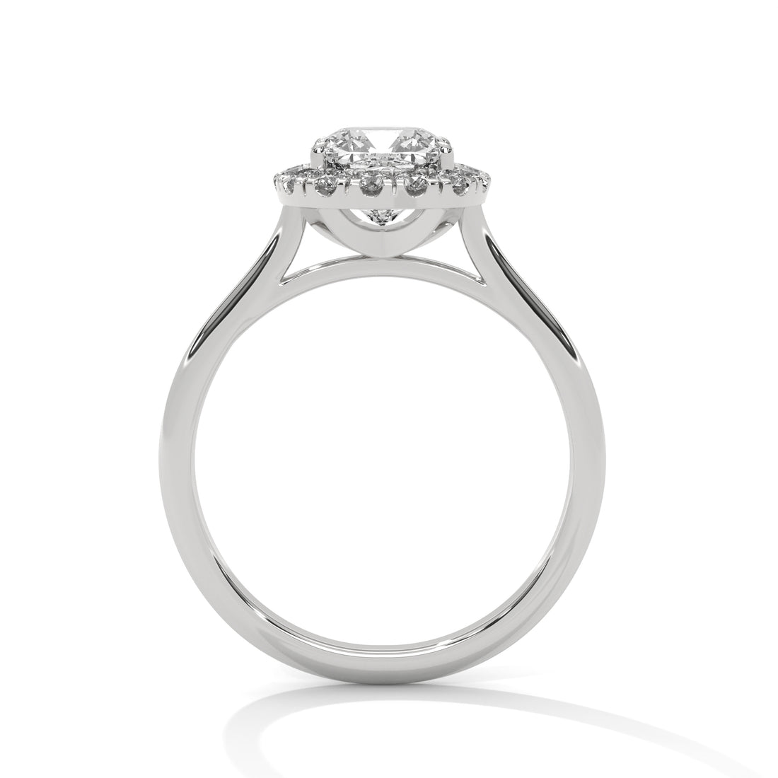 Silver ring with a diamond halo on a white background