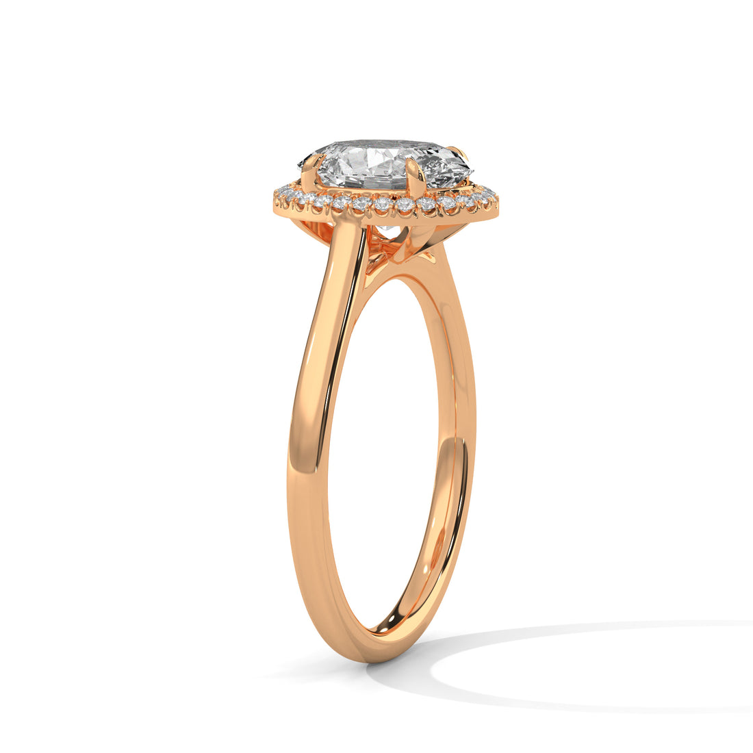 Rose gold ring with a diamond on a white background