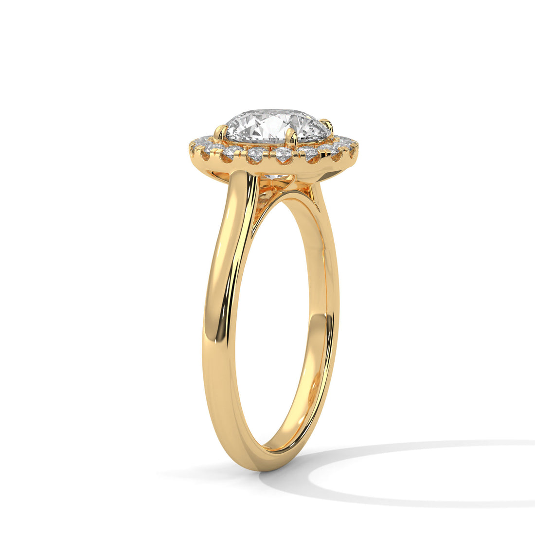 Gold ring with a diamond on a white background