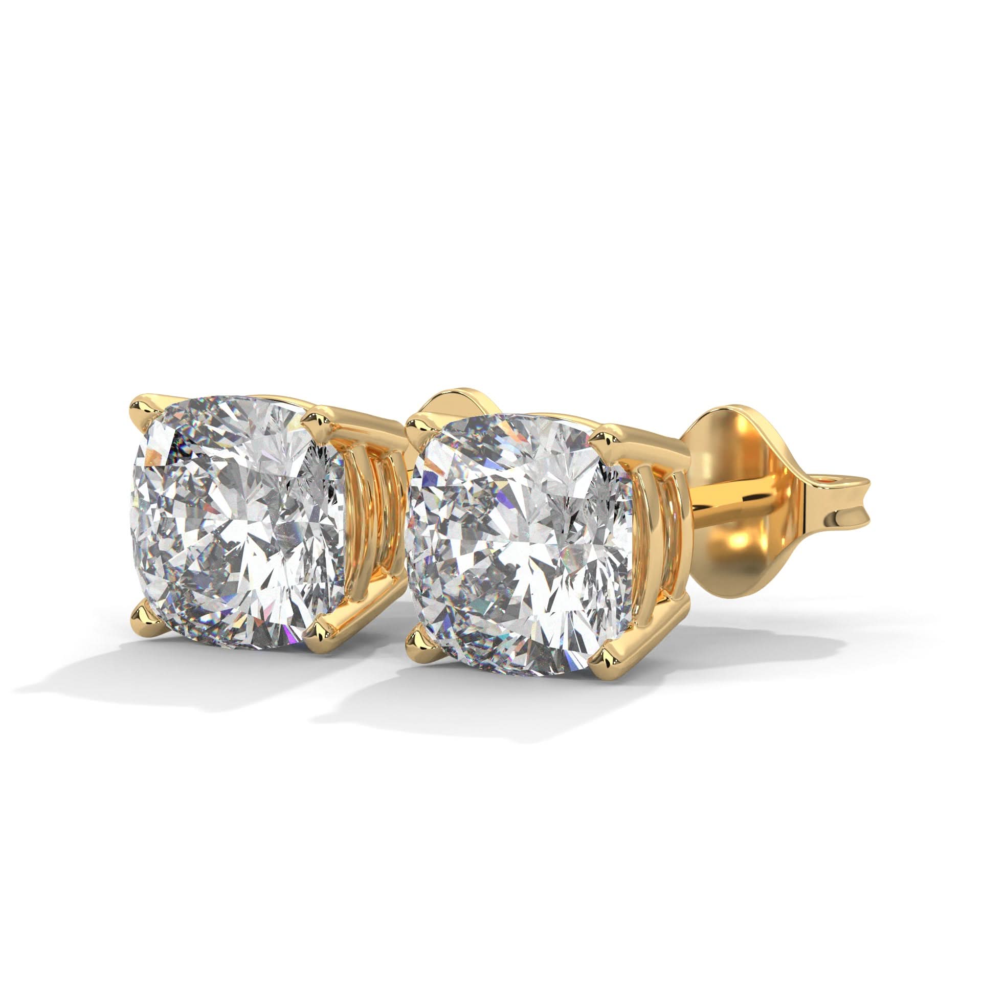 Gold stud earrings with clear gemstones on a white background