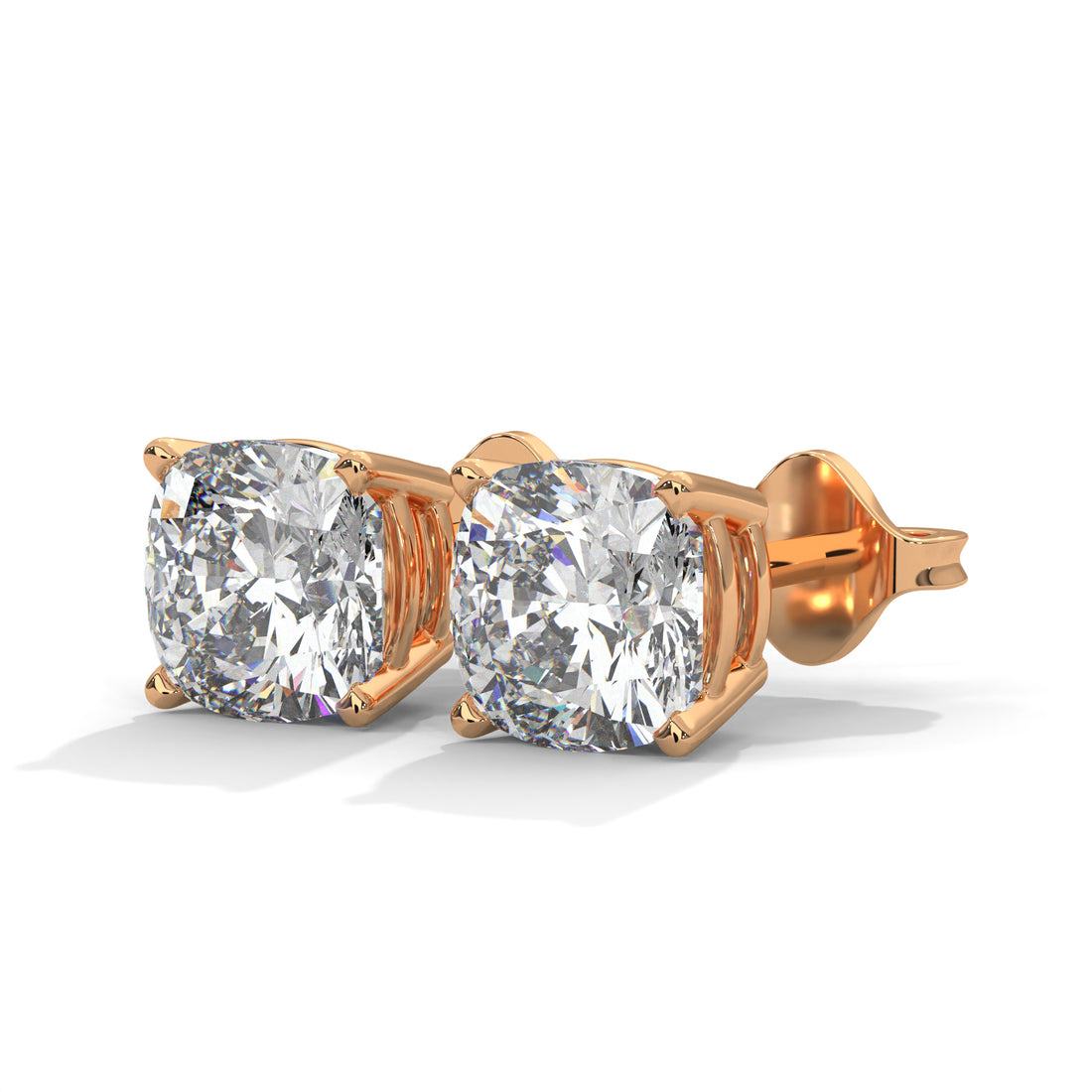 Rose gold diamond stud earrings on a white background