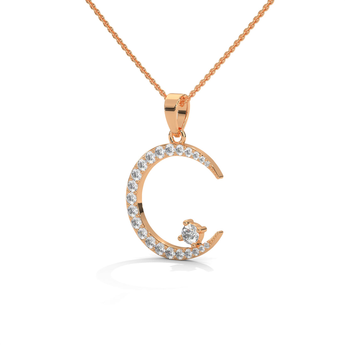 Rose gold necklace with pendant on a white background