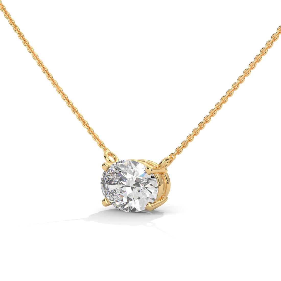 Gold necklace with a diamond pendant on a white background