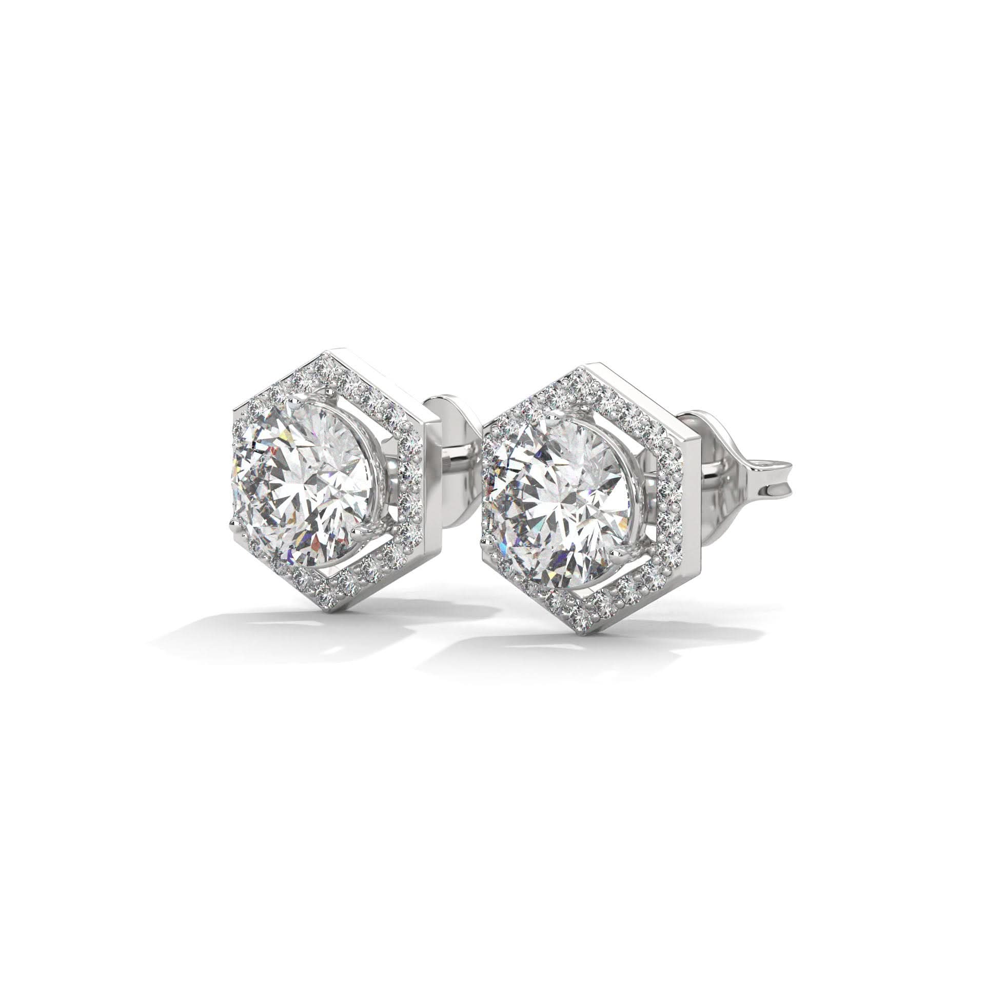 Diamond stud earrings with hexagonal prongs on a white background