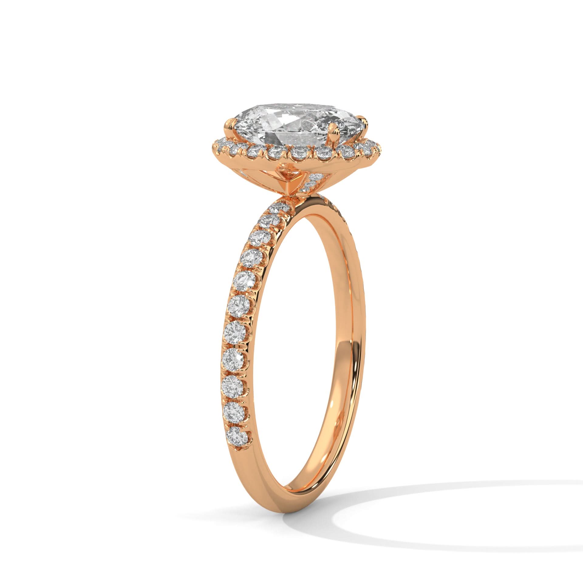 Rose gold ring with a diamond on a white background