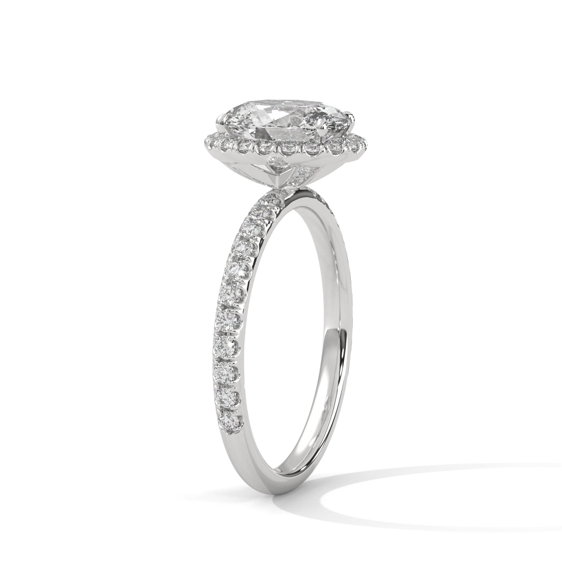 Diamond ring with a halo-style center stone on a white background