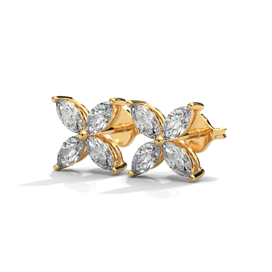 Gold earrings with clear Diamond on a white background