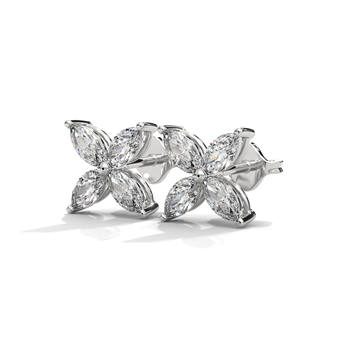 Pair of diamond earrings on a white background