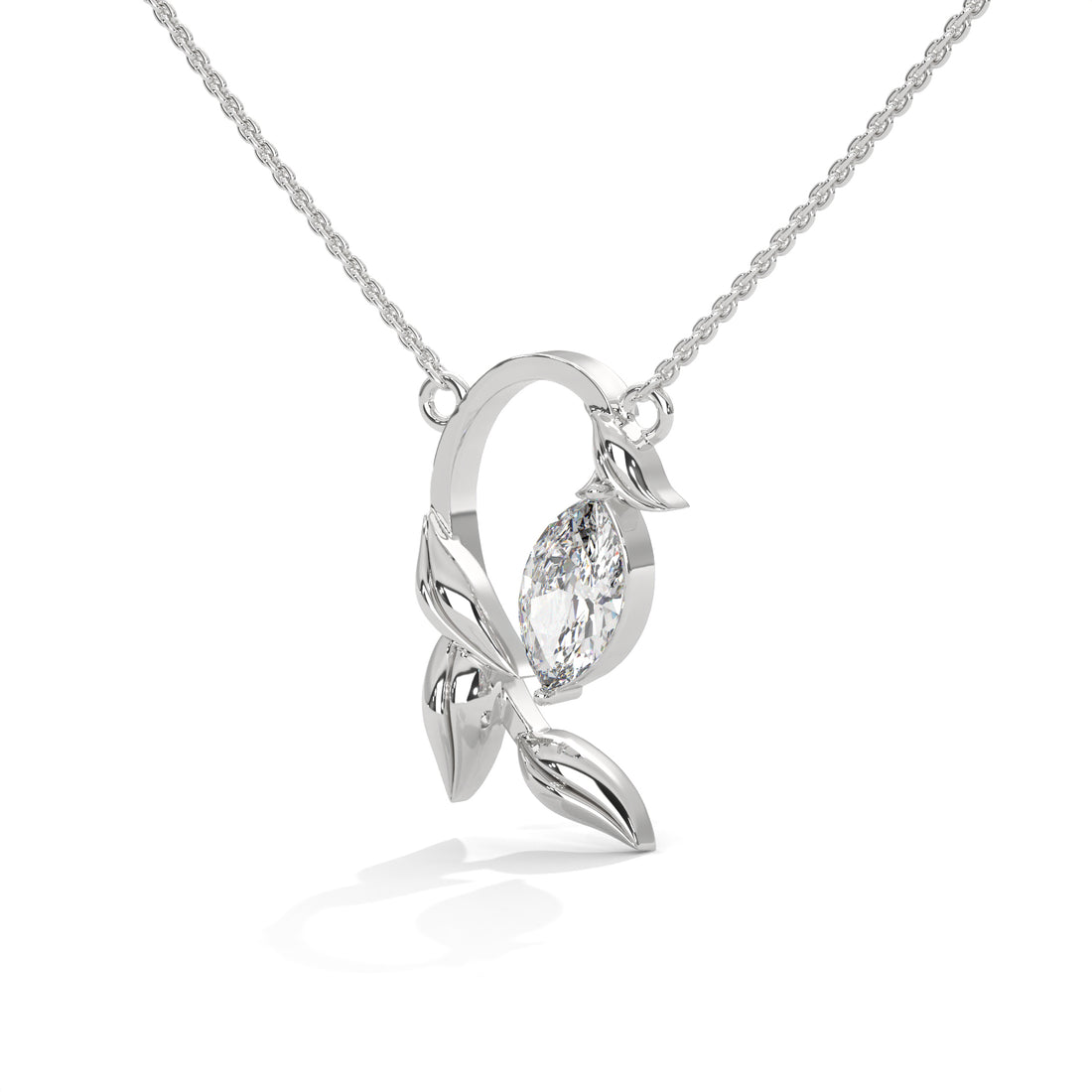 Silver necklace with a leaf-shaped pendant on a white background