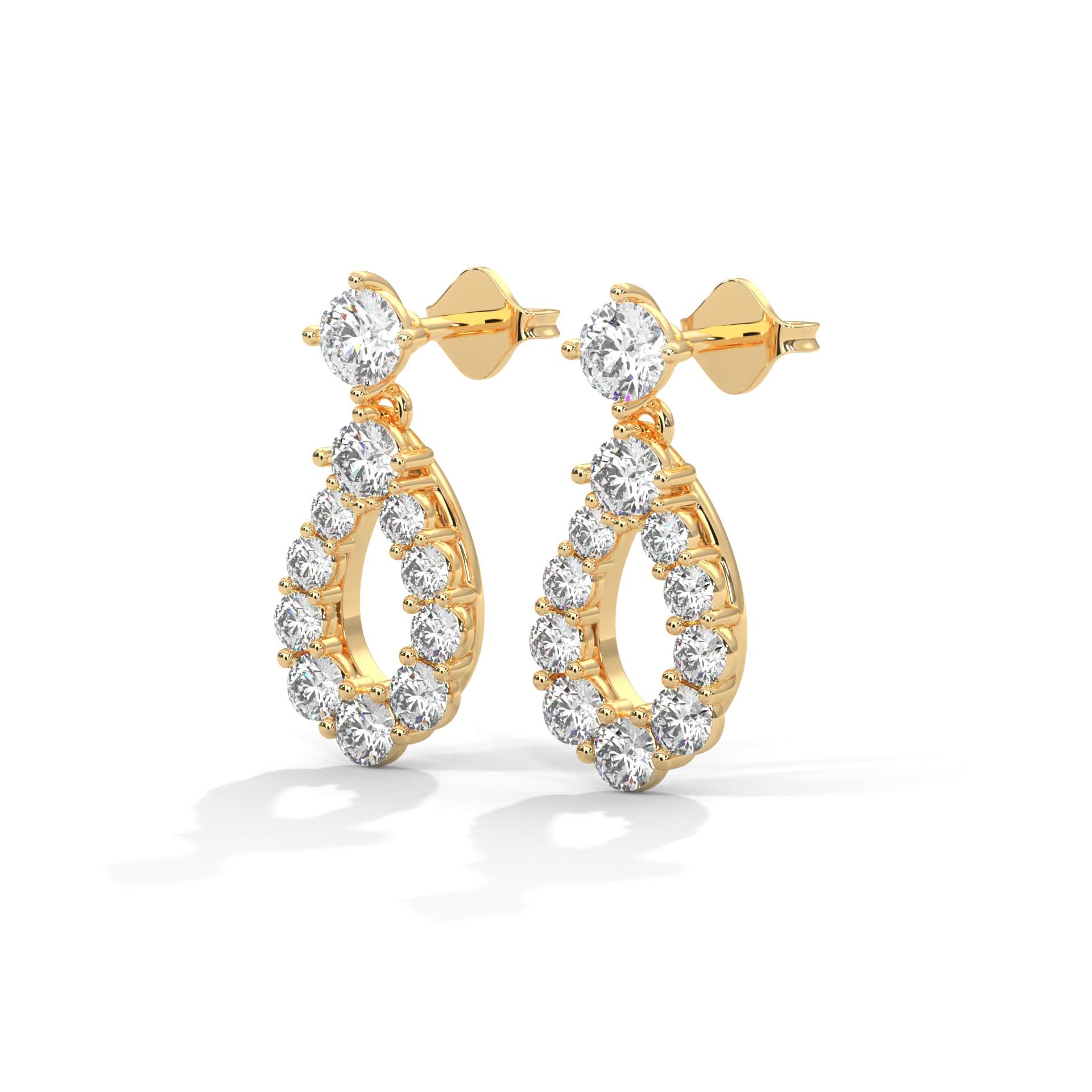 Gold hoop earrings with clear gemstones on a white background
