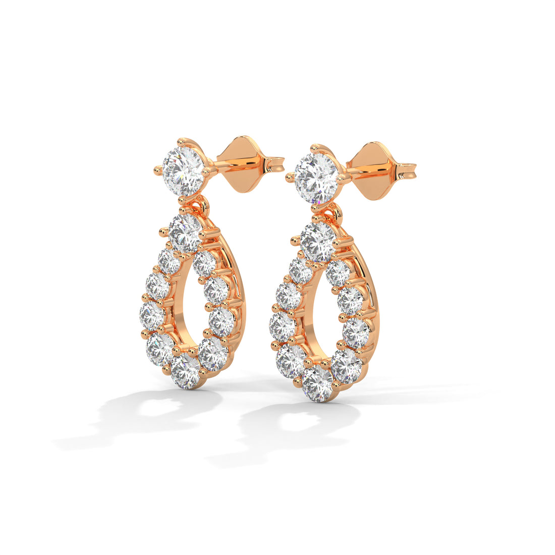 Rose gold hoop earrings with clear Diamond on a white background