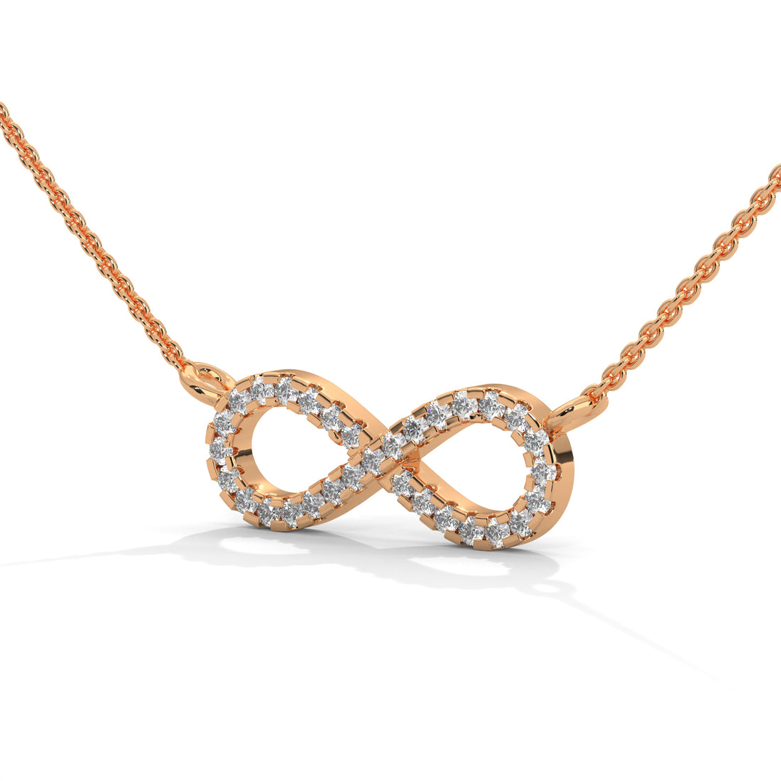 Rose gold infinity necklace with diamonds on a white background