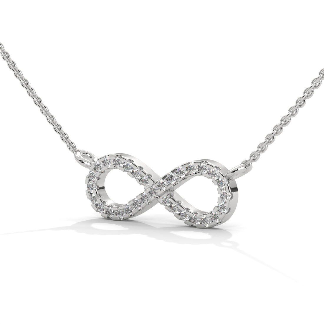Silver infinity necklace on a white background